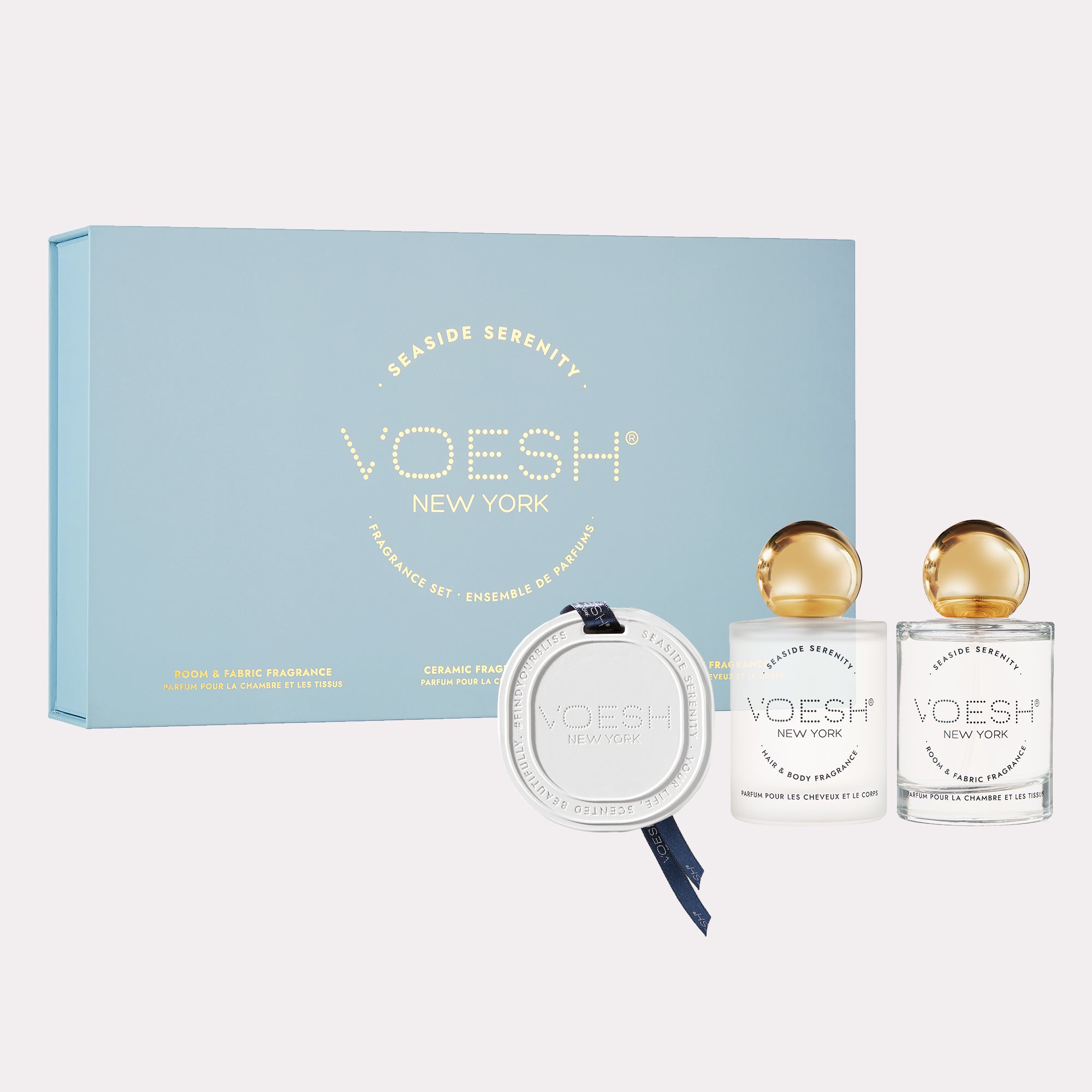 Seaside Serenity Fragrance Set Box, Ceramic Fragrance, Hair & Body Fragrance, and Room & Fabric Fragrance on a white background.